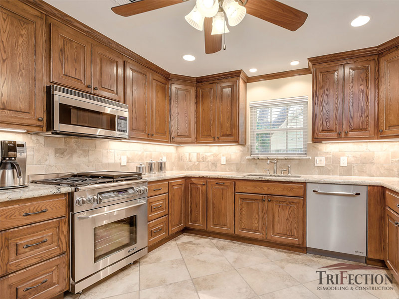 Oak Custom Cabinets By Trifection, White Quartz Countertops With Oak Cabinets