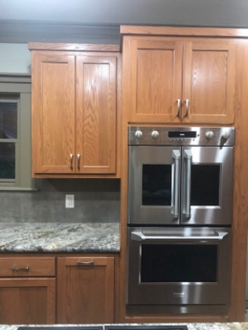New kitchen cabinets instead of refacing
